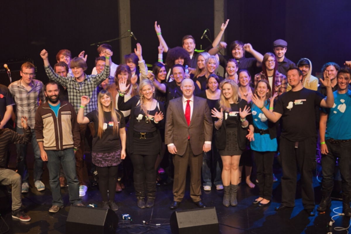 Creative Youth participants and supporters gathered on stage.