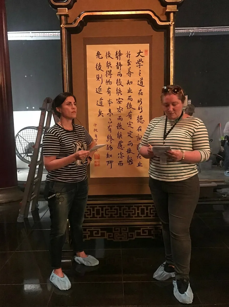 Sarah and Helen working on set